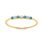 Load image into Gallery viewer, 7-stone-bezel-anniversary-diamond-band-with-blue-topaz-in-yellow-gold-FD9428RORGICBLTO-NL-YG.jpg
