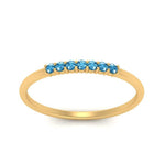 Load image into Gallery viewer, 7-stone-stacking-blue-topaz-wedding-band-in-yellow-gold-FD122844BGICBLTOANGLE3-NL-YG-GS.jpg
