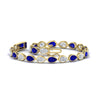 Load image into Gallery viewer, 7.68-carat-classic-teardrop-link-east-west-sapphire-bracelet-in-yellow-gold-FDBRCPE10581GSABLANGLE4-7.68CT-NL-YG.jpg?v=1776852362