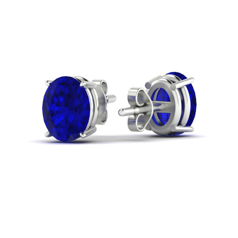 8-carat-oval-shaped-four-prong-sapphire-stud-earring-in-white-gold-fdear10411ovgsablangle4-8.00ct-nl-wg.jpg