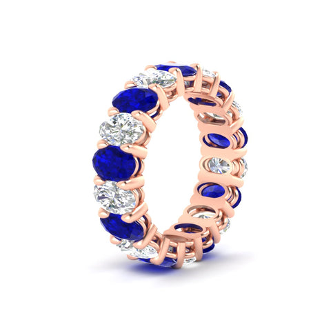 9-carat-oval-diamond-luxury-eternity-ring-with-blue-sapphire-in-rose-gold-fdewb8324ovgsablangle2-6.00x4.00mm-nl-rg