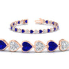 Load image into Gallery viewer, 9-ct-bezel-tennis-bracelet-heart-shaped-diamond-with-sapphire-in-rose-gold-fdbrc10581htgsablangle2-9-ct-nl-rg