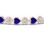 Load image into Gallery viewer, 9-ct-bezel-tennis-bracelet-heart-shaped-diamond-with-sapphire-in-rose-gold-fdbrc10581htgsablangle2-9-ct-nl-rg
