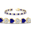 Load image into Gallery viewer, 9-ct-bezel-tennis-bracelet-heart-shaped-diamond-with-sapphire-in-yellow-gold-fdbrc10581htgsablangle2-9-ct-nl-yg