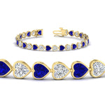 Load image into Gallery viewer, 9-ct-bezel-tennis-bracelet-heart-shaped-diamond-with-sapphire-in-yellow-gold-fdbrc10581htgsablangle2-9-ct-nl-yg
