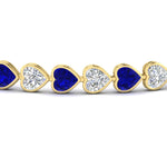Load image into Gallery viewer, 9-ct-bezel-tennis-bracelet-heart-shaped-diamond-with-sapphire-in-yellow-gold-fdbrc10581htgsablangle2-9-ct-nl-yg
