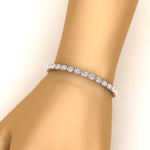 Load image into Gallery viewer, basket-tennis-bracelet-14-carat-oval-shaped-in-rose-gold-fdbrc10444angle2-14.00ct-nl-rg
