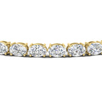 Load image into Gallery viewer, basket-tennis-bracelet-14-carat-oval-shaped-in-yellow-gold-fdbrc10444angle2-14.00ct-nl-yg
