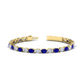 Thumbnail 67 - basket-tennis-bracelet-14-carat-oval-shaped-in-yellow-gold-fdbrc10444gsablangle2-14.00ct-nl-yg