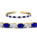 Thumbnail 66 - basket-tennis-bracelet-14-carat-oval-shaped-in-yellow-gold-fdbrc10444gsablangle2-14.00ct-nl-yg
