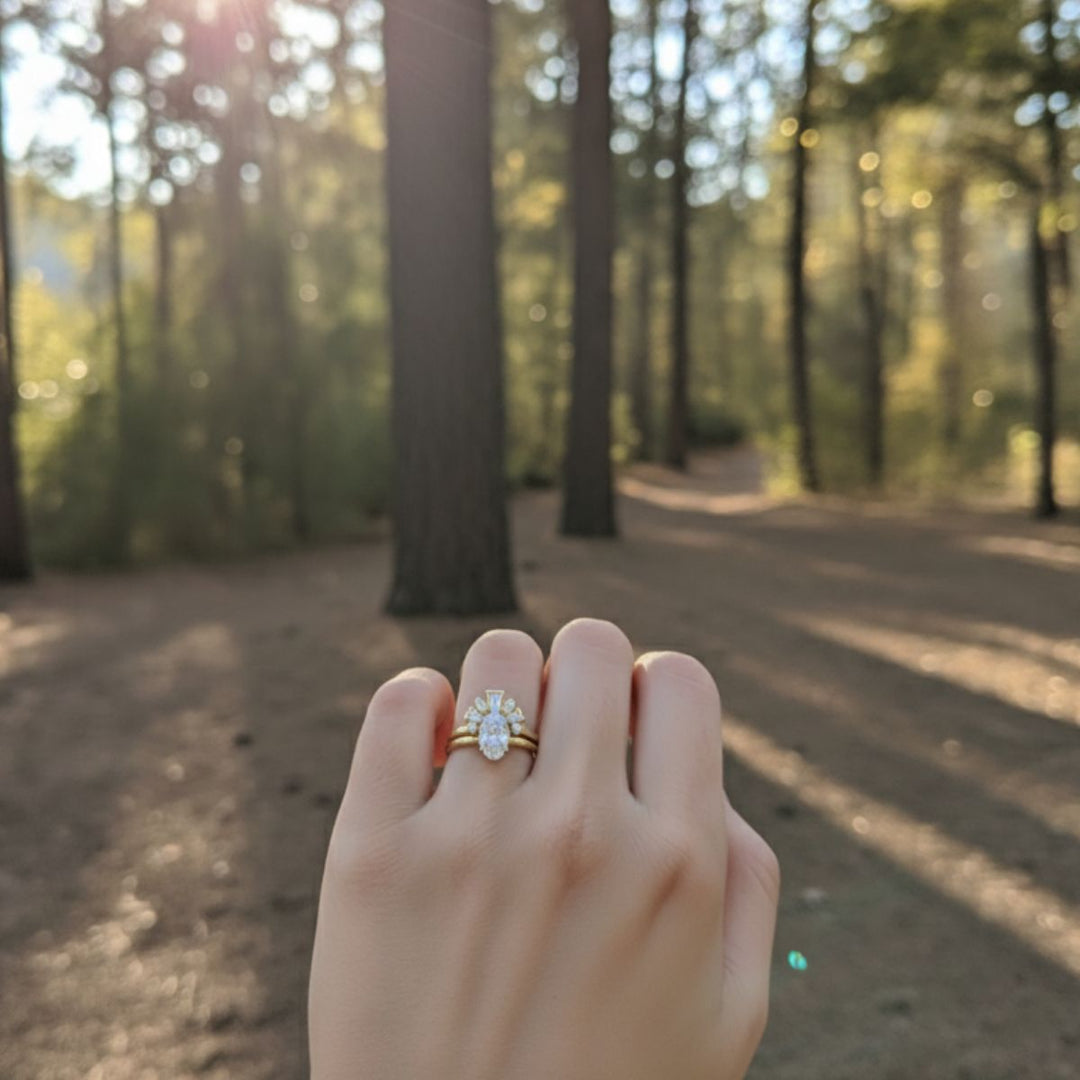 Curved bagutte band with oval diamond 