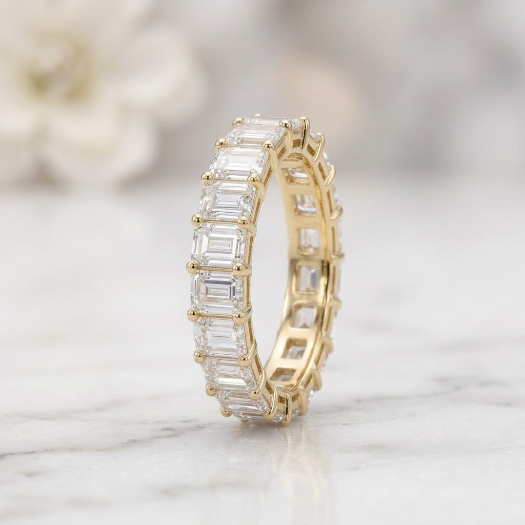 Ring #2: Emerald Cut Diamond Eternity Band (The Hero Piece)
