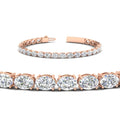 Thumbnail 1 - oval-shaped-13-carat-basket-tennis-bracelet-in-rose-gold-fdbrc10444angle2-13.00-ct-nl-rg