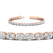 oval-shaped-13-carat-basket-tennis-bracelet-in-rose-gold-fdbrc10444angle2-13.00-ct-nl-rg