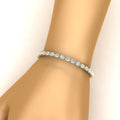 Thumbnail 15 - oval-shaped-13-carat-basket-tennis-bracelet-in-yellow-gold-fdbrc10444angle2-13.00-ct-nl-yg