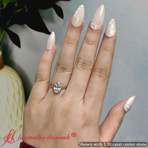 Oval-shaped-bezel-set-split-shank-diamond-ring-in-14k-yellow-gold-FD11229OVR-1