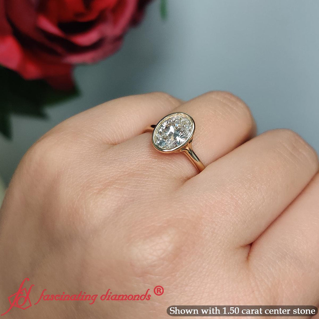 Oval-shaped-bezel-set-split-shank-lab-diamond-ring-in-14K-rose-gold-FD11229OVR-3