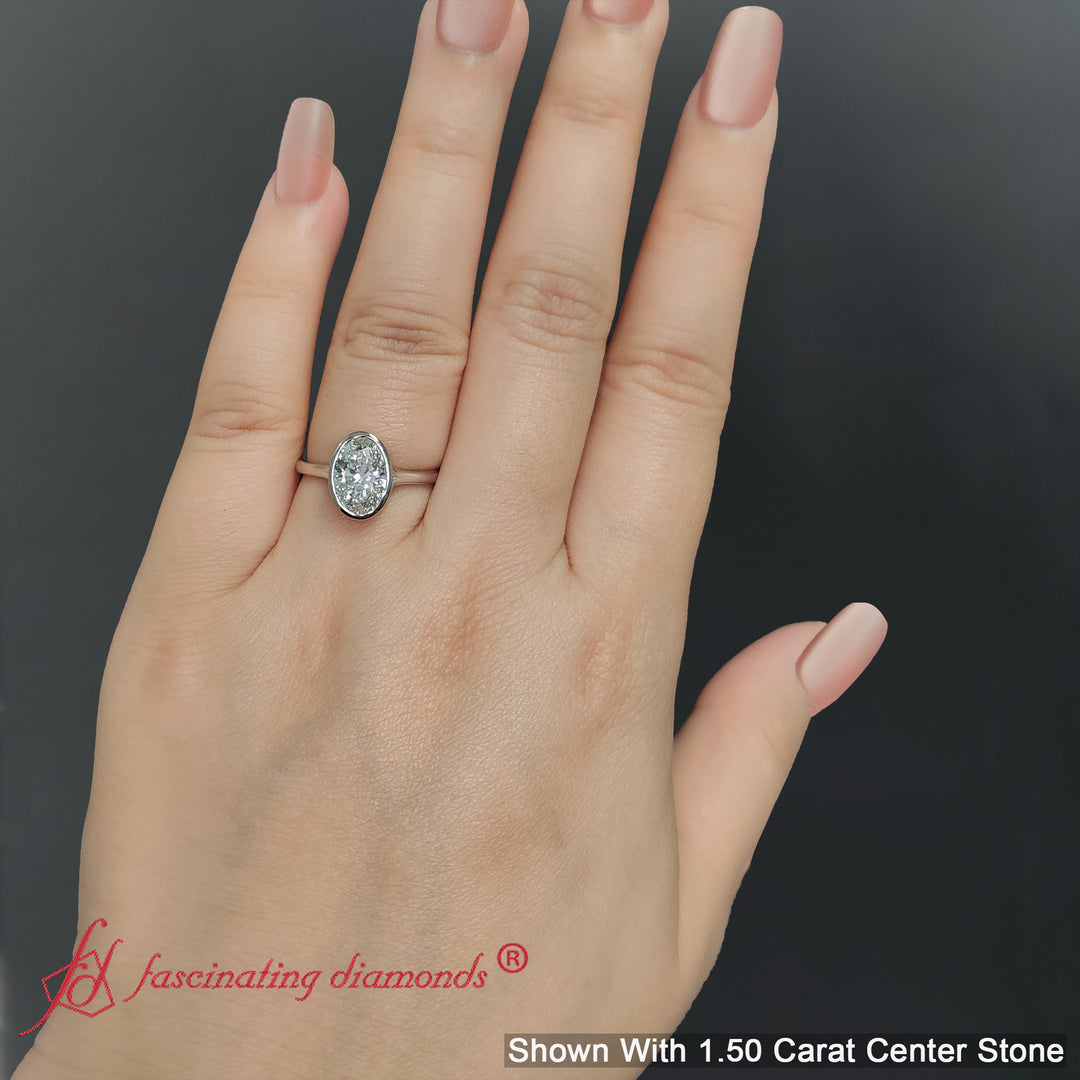 Split Shank Oval Shaped Bezel Set Solitaire Ring