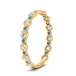Load image into Gallery viewer, alternating-bezel-set-round-diamond-wedding-band-with-blue-topaz-in-yellow-gold-FD65654BGICBLTO-NL-YG.jpg
