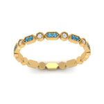 Load image into Gallery viewer, art-deco-thin-stacking-diamond-eternity-band-with-blue-topaz-in-yellow-gold-FDEWB2139GICBLTOANGLE3-NL-YG.jpg
