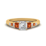 Load image into Gallery viewer, asscher-cut-channel-three-stone-diamond-engagement-ring-with-orange-sapphire-in-yellow-gold-FDENS205ASRGSAOR-NL-YG.jpg
