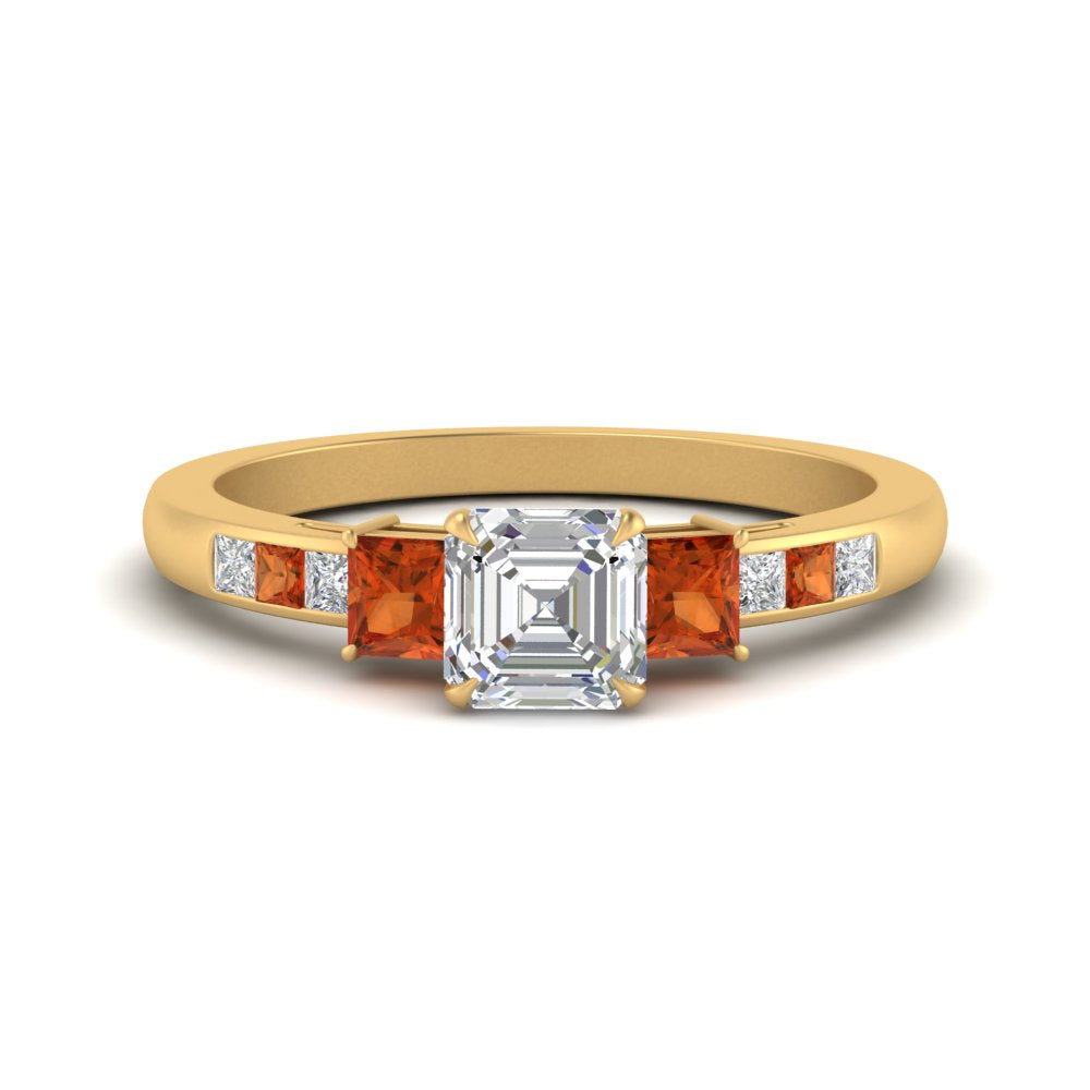 asscher-cut-channel-three-stone-diamond-engagement-ring-with-orange-sapphire-in-yellow-gold-FDENS205ASRGSAOR-NL-YG.jpg