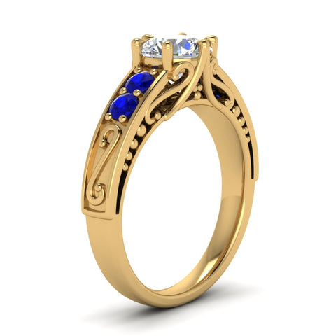 beautiful-filigree-6-prong-diamond-engagement-ring-with-sapphire-in-yellow-gold-FD9143RORGSABLANGLE2-NL-YG.jpg?v=1759984480