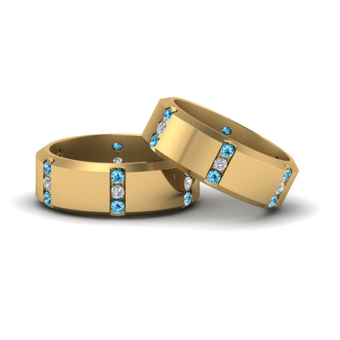 beveled-gay-diamond-ring-with-ice-blue-topaz-in-14K-yellow-gold-FDLG8113BGICBLTO-NL-YG
