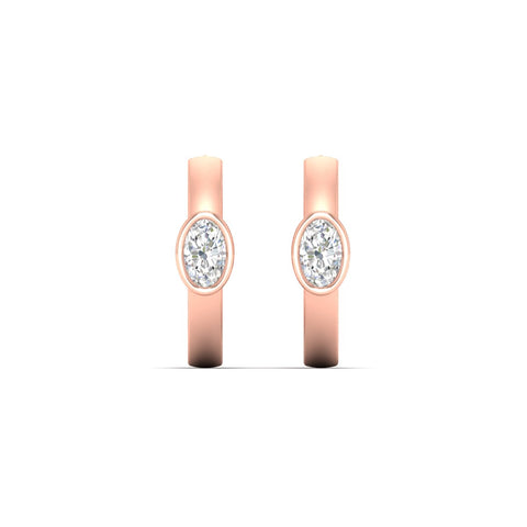 bezel-oval-diamond-huggie-hoop-earrings-in-white-gold-fdear11743ovangle2-nl-rg.jpg?v=1778041211