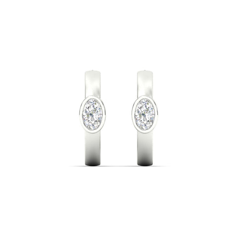 bezel-oval-diamond-huggie-hoop-earrings-in-yellow-gold-fdear11743ovangle2-nl-wg.jpg?v=1778041211