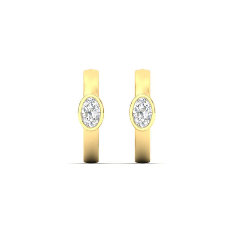 bezel-oval-diamond-huggie-hoop-earrings-in-white-gold-fdear11743ovangle2-nl-yg.jpg?v=1778041211