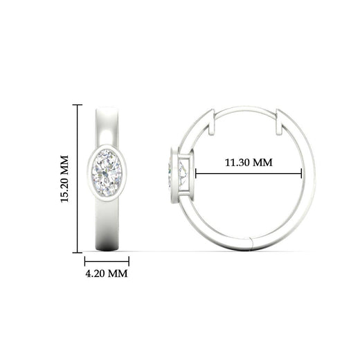 bezel-oval-diamond-huggie-hoop-earrings-in-yellow-gold-fdear11743ovangle3-nl-wg-hw.jpg?v=1778041211