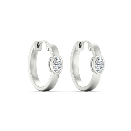 bezel-oval-diamond-huggie-hoop-earrings-in-yellow-gold-fdear11743ovangle4-nl-wg.jpg?v=1778041211