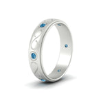Load image into Gallery viewer, bezel-set-blue-topaz-mens-wedding-band-in-white-gold-fdm1284gicbltoangle2-nl-wg
