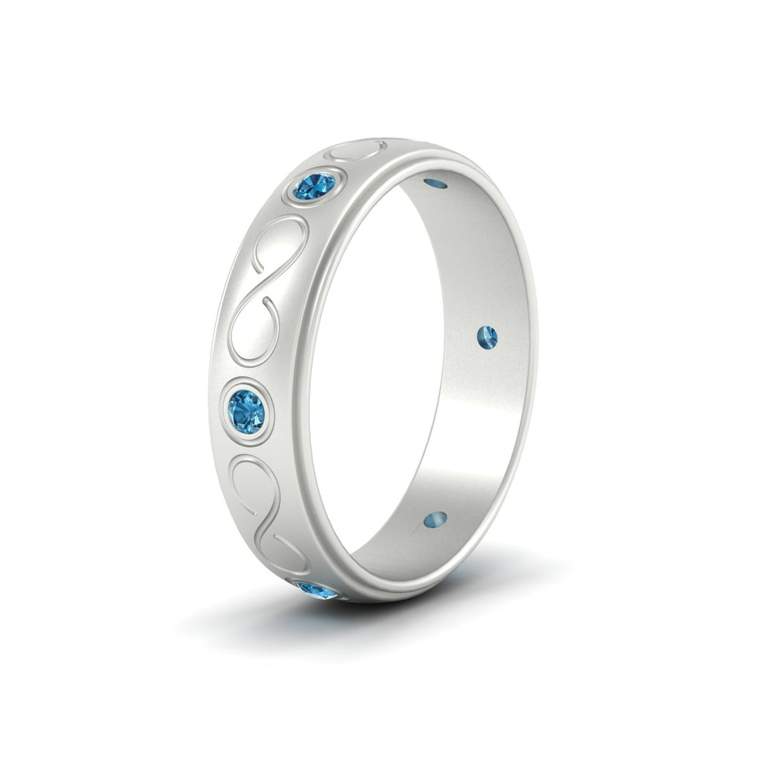 bezel-set-blue-topaz-mens-wedding-band-in-white-gold-fdm1284gicbltoangle2-nl-wg