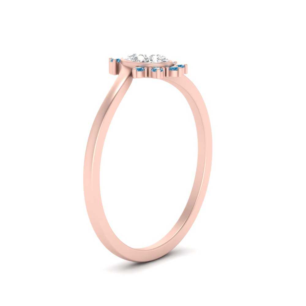 bezel-set-pear-crown-blue-topaz-engagement-ring-in-rose-gold-FD1046PERGICBLTOANGLE2-NL-RG.jpg?v=1766490256