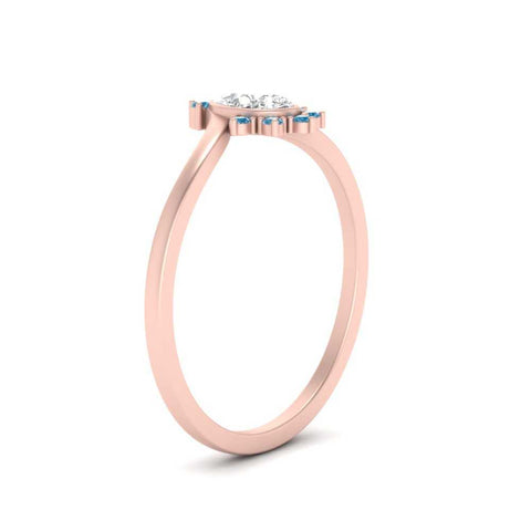 bezel-set-pear-crown-blue-topaz-engagement-ring-in-rose-gold-FD1046PERGICBLTOANGLE2-NL-RG_77ff2d3c-ed33-4d6f-aac6-5f6f3a9fd810.jpg?v=1766490278