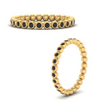 Load image into Gallery viewer, bezel-set-round-black-diamond-stacking-band-in-yellow-gold-FDEWB11036GBLACKANGLE3-NL-YG.jpg

