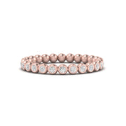 bezel-set-round-diamond-stacking-band-in-rose-gold-FDEWB11036ANGLE3-NL-RG.jpg