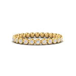 Load image into Gallery viewer, bezel-set-round-diamond-stacking-band-in-yellow-gold-FDEWB11036ANGLE3-NL-YG.jpg
