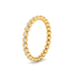 Load image into Gallery viewer, bezel-set-round-diamond-stacking-band-in-yellow-gold-FDEWB11036ANGLE3-NL-YG.jpg
