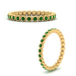 Load image into Gallery viewer, bezel-set-round-emerald-stacking-band-in-yellow-gold-FDEWB11036GEMGRANGLE3-NL-YG.jpg

