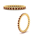 Load image into Gallery viewer, bezel-set-round-ruby-stacking-band-in-yellow-gold-FDEWB11036GRUDRANGLE3-NL-YG.jpg
