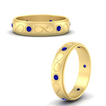 Load image into Gallery viewer, bezel-set-sapphire-mens-wedding-band-in-yellow-gold-fdm1284gsablangle3-nl-yg
