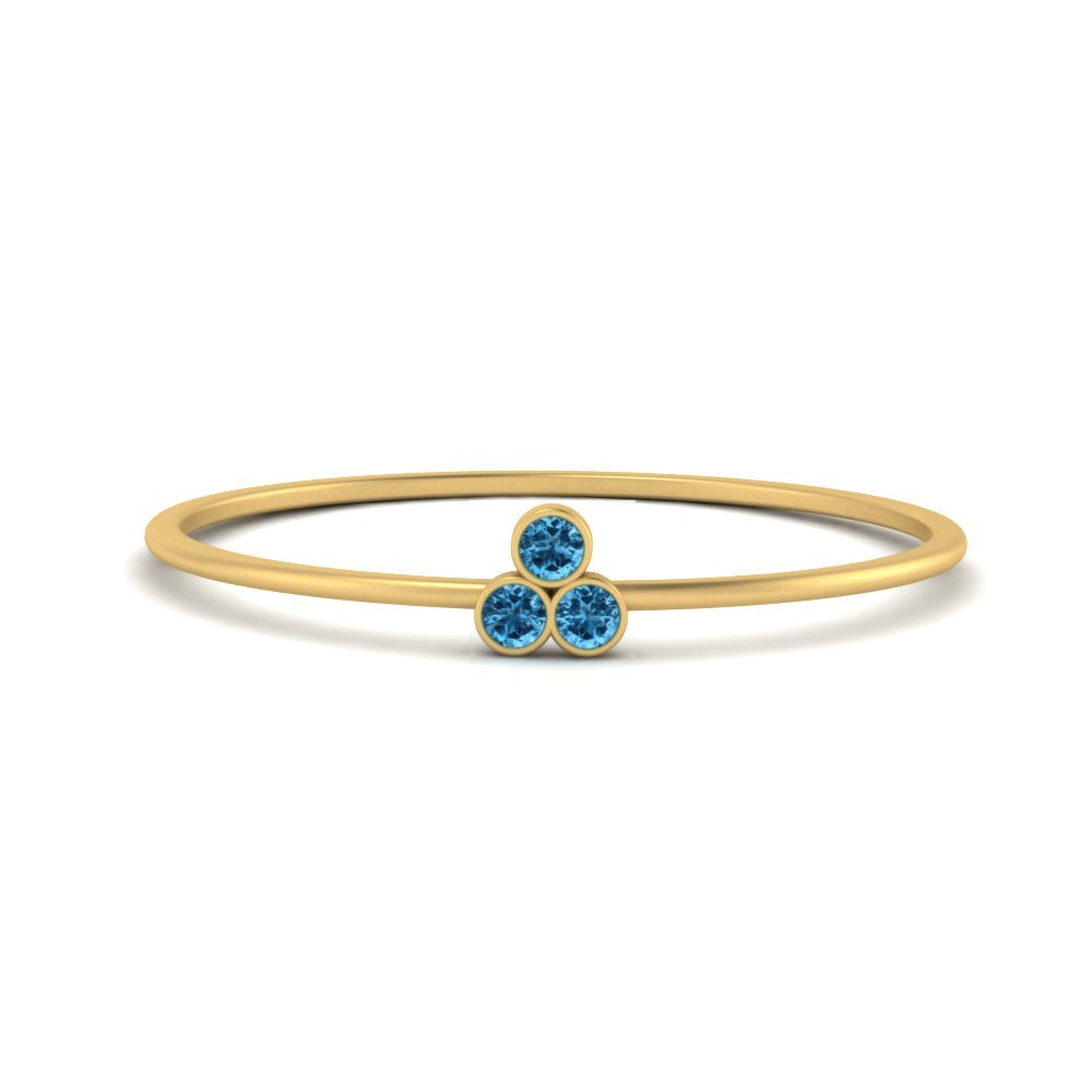 bezel-setting-3-blue-topaz-stackable-ring-in-yellow-gold-FD9418RORGICBLTO-NL-YG.jpg