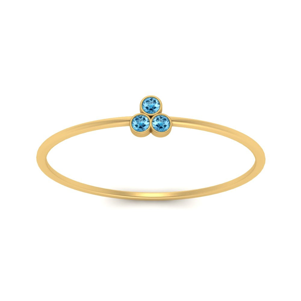 bezel-setting-3-blue-topaz-stackable-ring-in-yellow-gold-FD9418RORGICBLTO-NL-YG.jpg