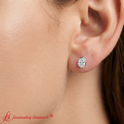 Oval Bezel Set Solitaire Stud Earrings [IGI Certified]