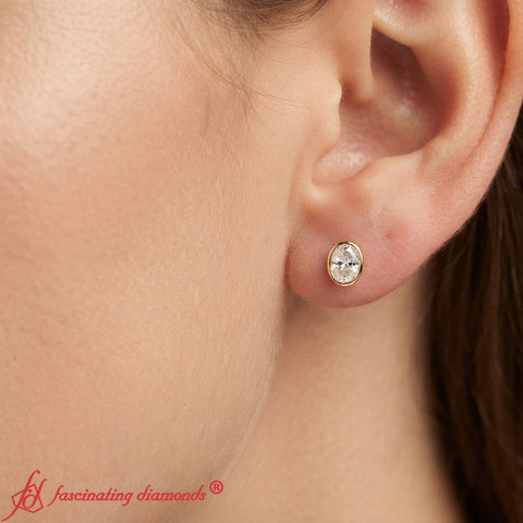 Oval Bezel Set Solitaire Stud Earrings [IGI Certified]