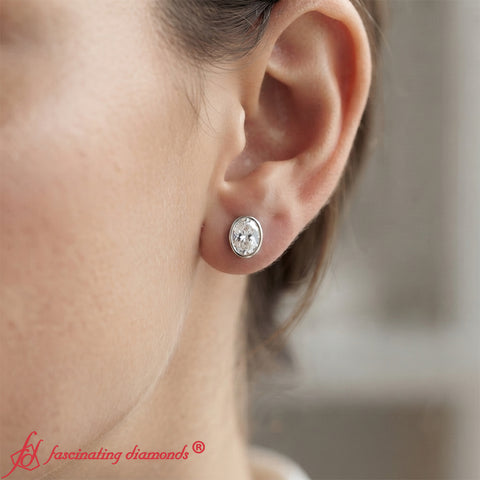 Oval Bezel Set Solitaire Stud Earrings [IGI Certified]