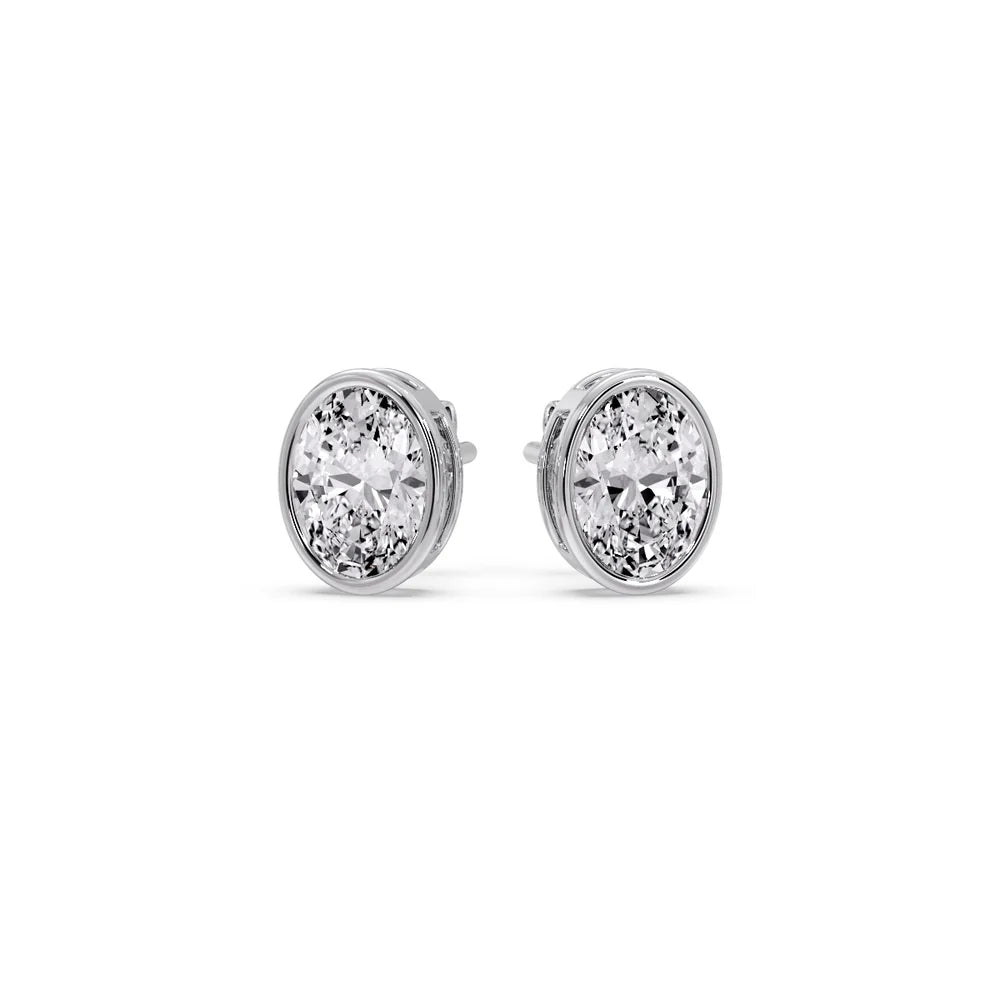 Bezel stud earring oval diamond in white gold